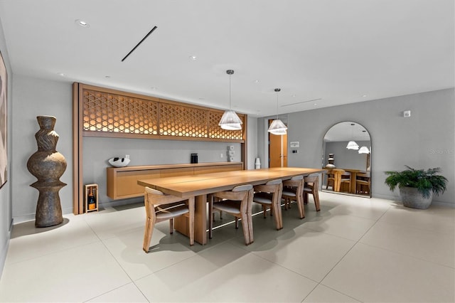 dining room featuring light tile patterned floors