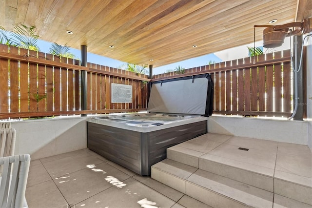 view of patio / terrace featuring a hot tub