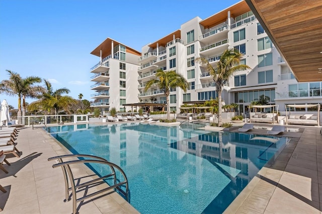 view of swimming pool featuring a patio area