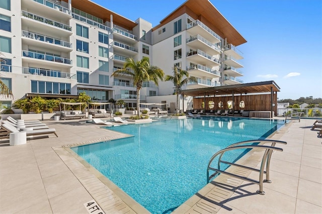 view of swimming pool with a patio area