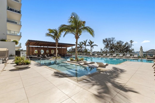 view of swimming pool featuring a patio