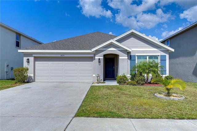 ranch-style house with a garage, concrete driveway, roof with shingles, a front yard, and stucco siding