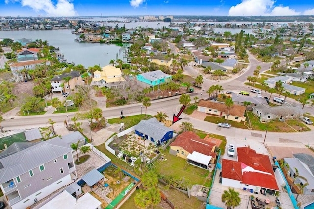 aerial view with a water view and a residential view