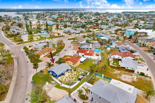 aerial view with a residential view and a water view