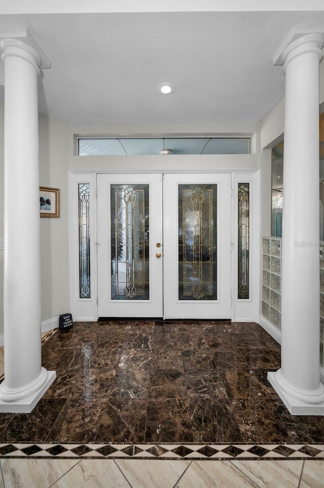 property entrance featuring french doors