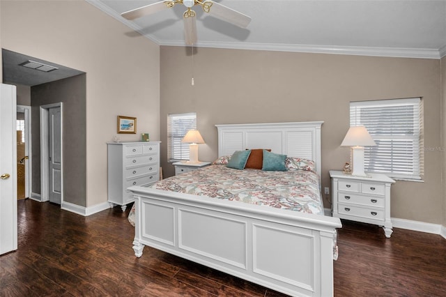 bedroom with dark wood-style flooring, multiple windows, and crown molding