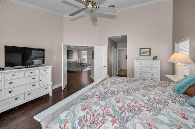 bedroom with a high ceiling, visible vents, dark wood-style flooring, and crown molding