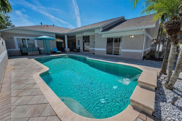 view of swimming pool featuring a patio area, fence, and a fenced in pool