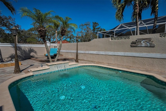 view of swimming pool with a fenced backyard and a fenced in pool