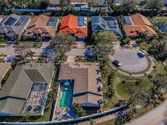 birds eye view of property with a residential view