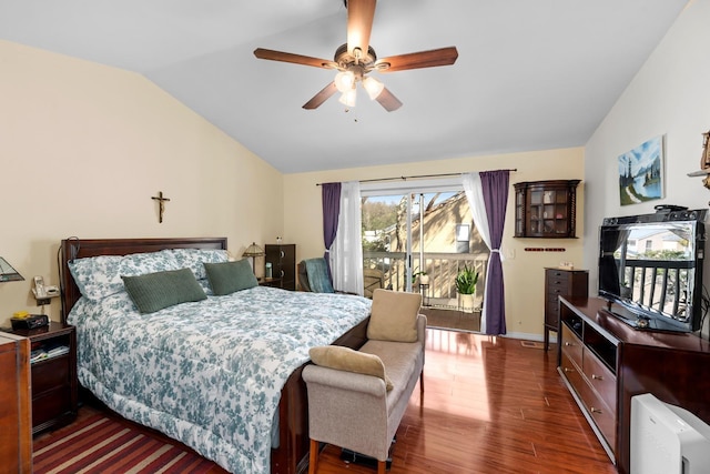 bedroom featuring ceiling fan, lofted ceiling, and dark hardwood / wood-style floors