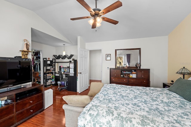 bedroom with lofted ceiling, wood-type flooring, and ceiling fan