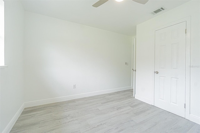 unfurnished bedroom featuring ceiling fan and light hardwood / wood-style flooring