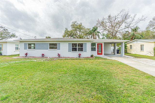 ranch-style house featuring a carport and a front yard