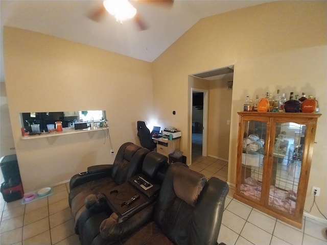 tiled living room with ceiling fan and vaulted ceiling