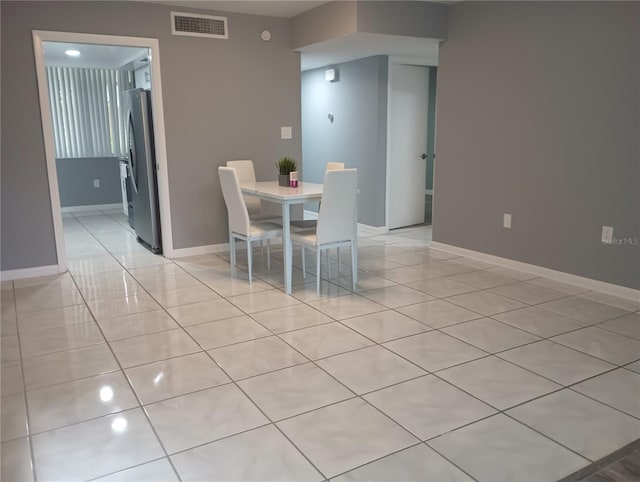 view of tiled dining room