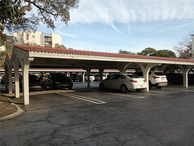 view of parking with a carport