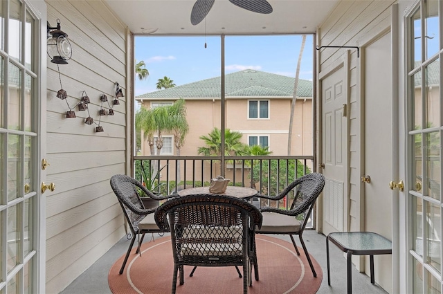 exterior space featuring french doors and a ceiling fan