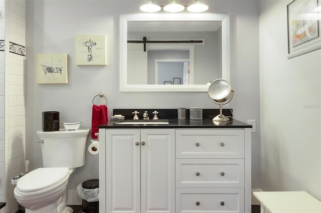 full bath featuring toilet and vanity