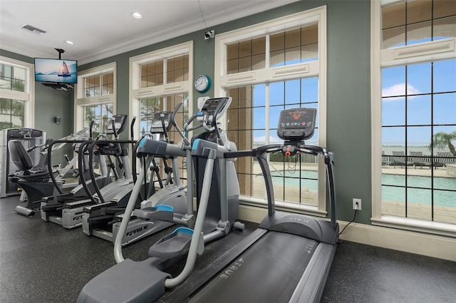 exercise room with baseboards, recessed lighting, visible vents, and crown molding