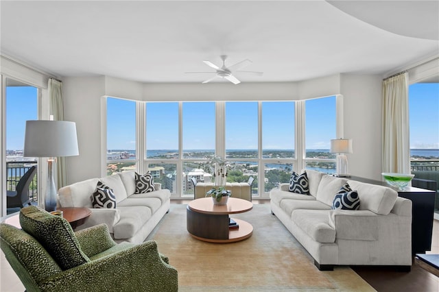 450 Knights Run Ave Unit 1704, Tampa, FL 33602 - living area featuring a ceiling fan and a water view
