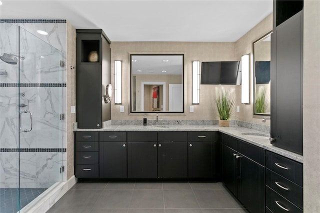 450 Knights Run Ave Unit 1704, Tampa, FL 33602 - bathroom with double vanity, tile patterned flooring, and a marble finish shower