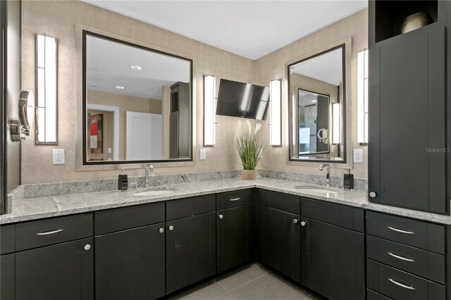 450 Knights Run Ave Unit 1704, Tampa, FL 33602 - bathroom with double vanity and tile patterned flooring