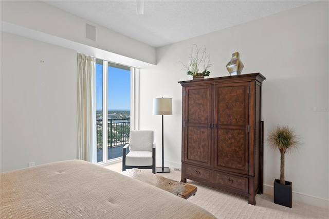 450 Knights Run Ave Unit 1704, Tampa, FL 33602 - bedroom with light carpet, access to outside, and a water view