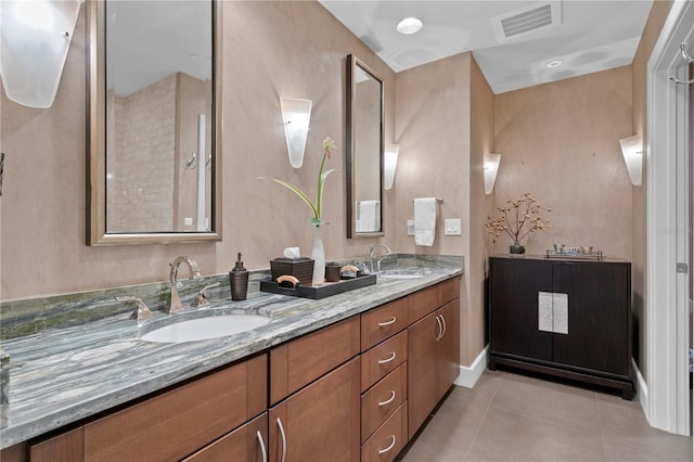 450 Knights Run Ave Unit 1704, Tampa, FL 33602 - bathroom with double vanity and tile patterned flooring