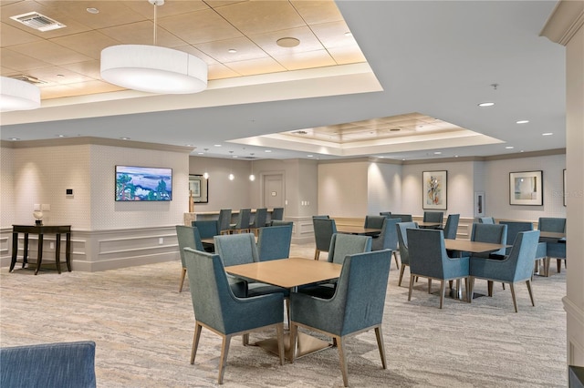 450 Knights Run Ave Unit 1704, Tampa, FL 33602 - dining area with a tray ceiling, a wainscoted wall, a decorative wall, and recessed lighting