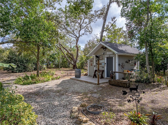 exterior space with a shed