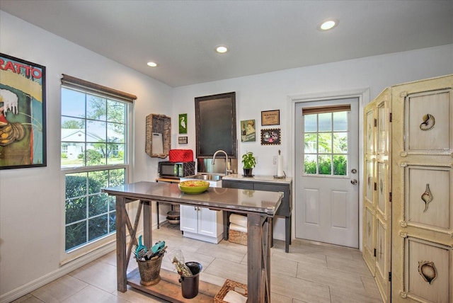 dining space featuring sink