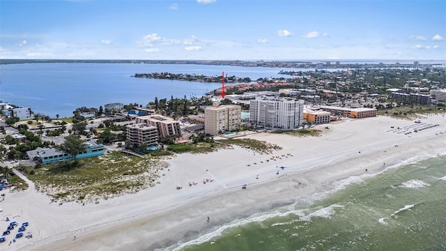 birds eye view of property featuring a water view and a view of the beach