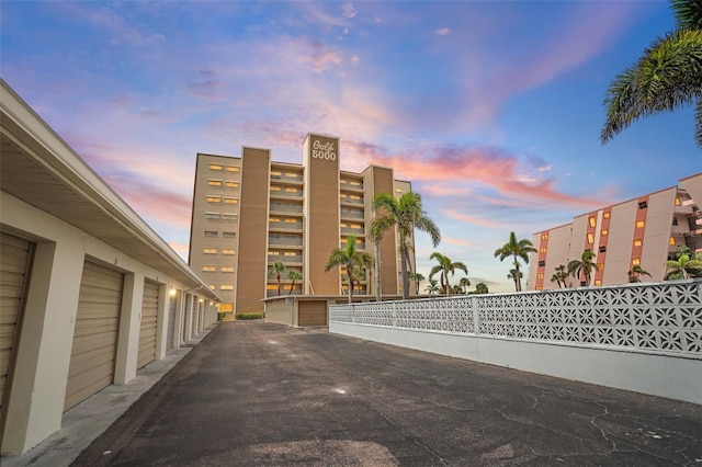 view of outdoor building at dusk