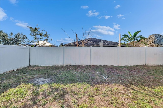 view of yard featuring a fenced backyard