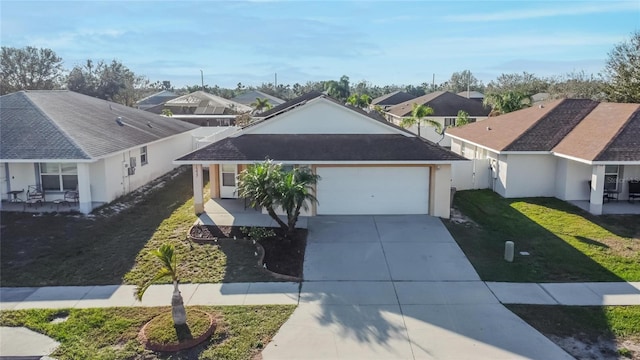 single story home featuring concrete driveway, a front lawn, an attached garage, and a residential view