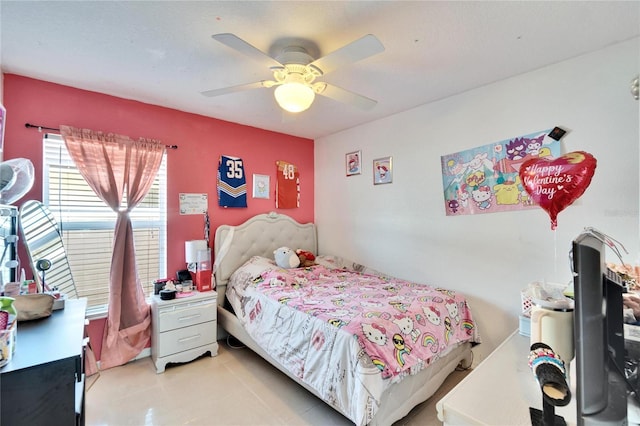 bedroom with light tile patterned floors and ceiling fan