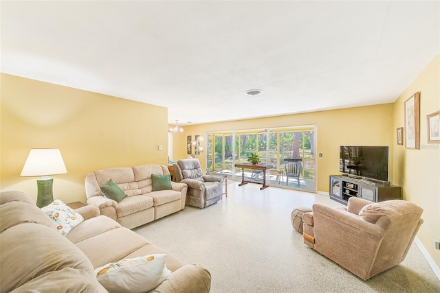 living room featuring a chandelier