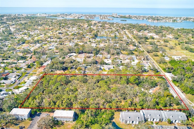 bird's eye view with a water view