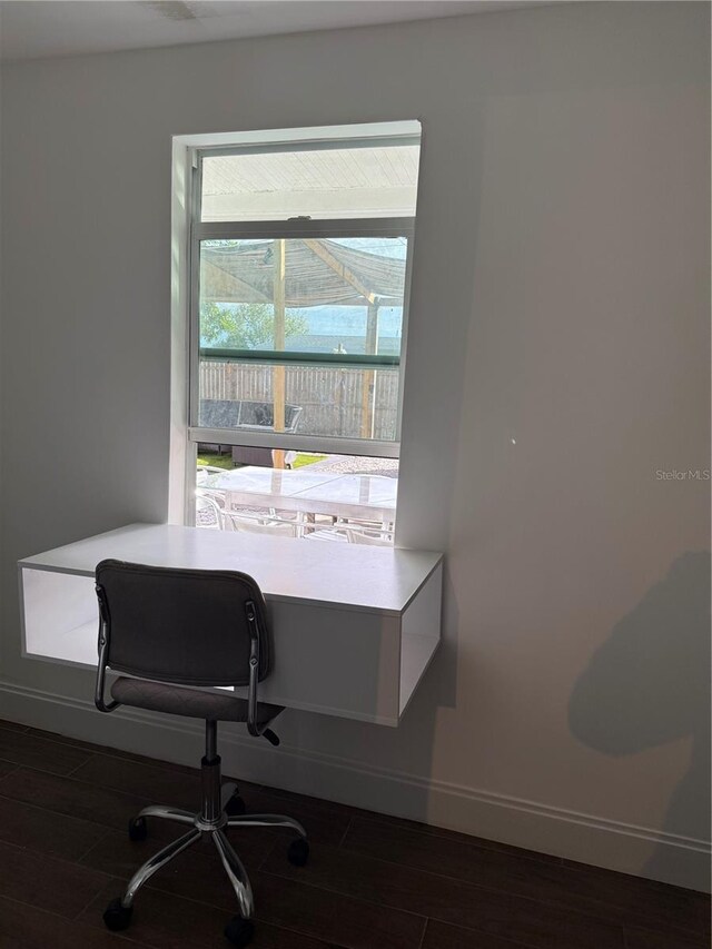 907 Fruitland Ave, Bradenton, FL 34207 - office space featuring baseboards and dark wood-style flooring