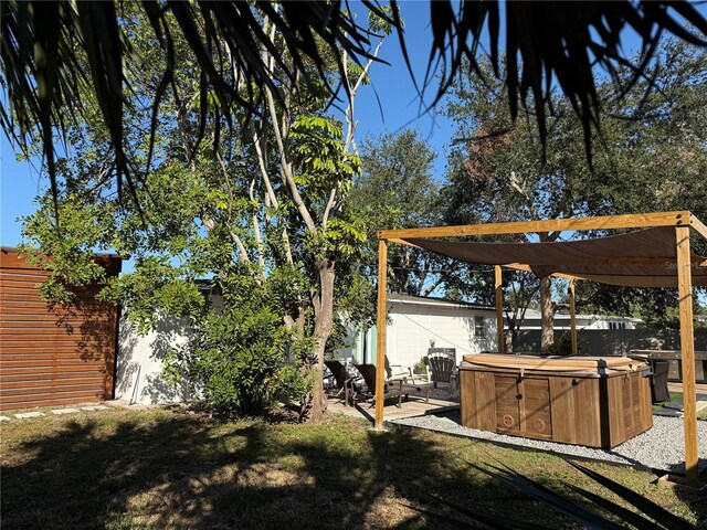 907 Fruitland Ave, Bradenton, FL 34207 - view of yard featuring a hot tub, fence, and a patio