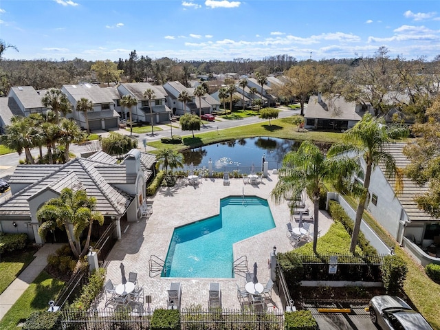 aerial view featuring a water view and a residential view