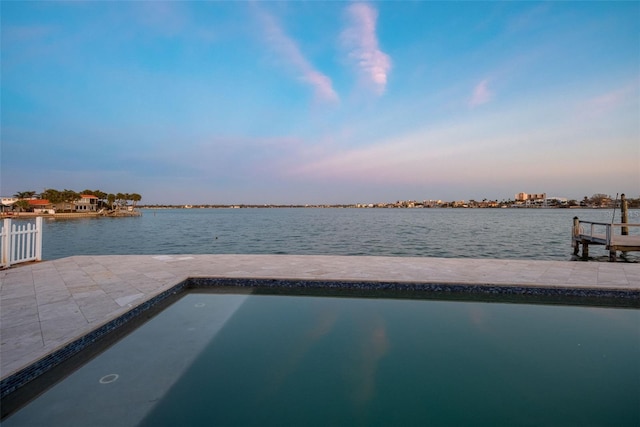 dock area featuring a water view