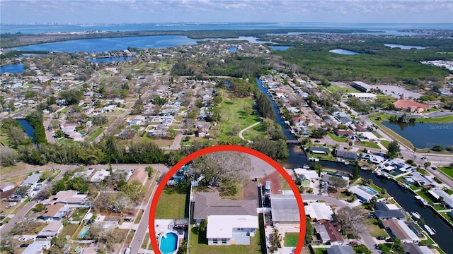 aerial view with a water view and a residential view