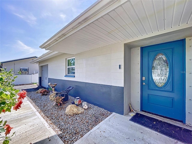 property entrance with fence