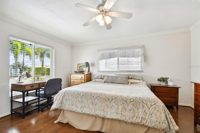 bedroom featuring dark wood-style floors, baseboards, and crown molding