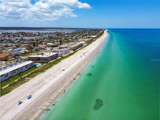 drone / aerial view with a view of the beach and a water view