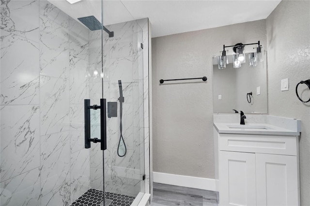 bathroom with vanity and walk in shower