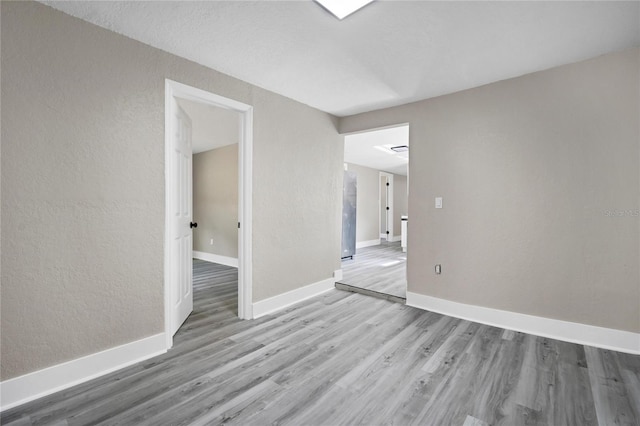 empty room featuring light wood-type flooring