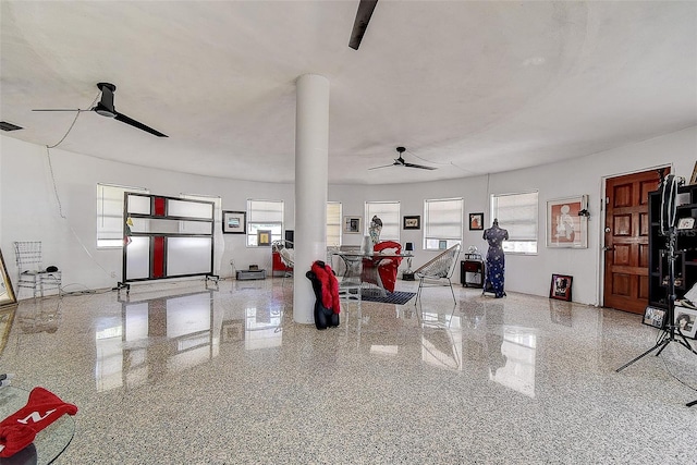 garage with visible vents and a ceiling fan